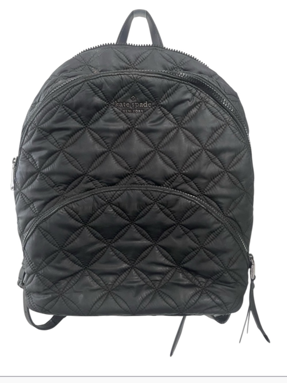 kate spade black quilted backpack w logo interior label. Flaws at bottom of bag